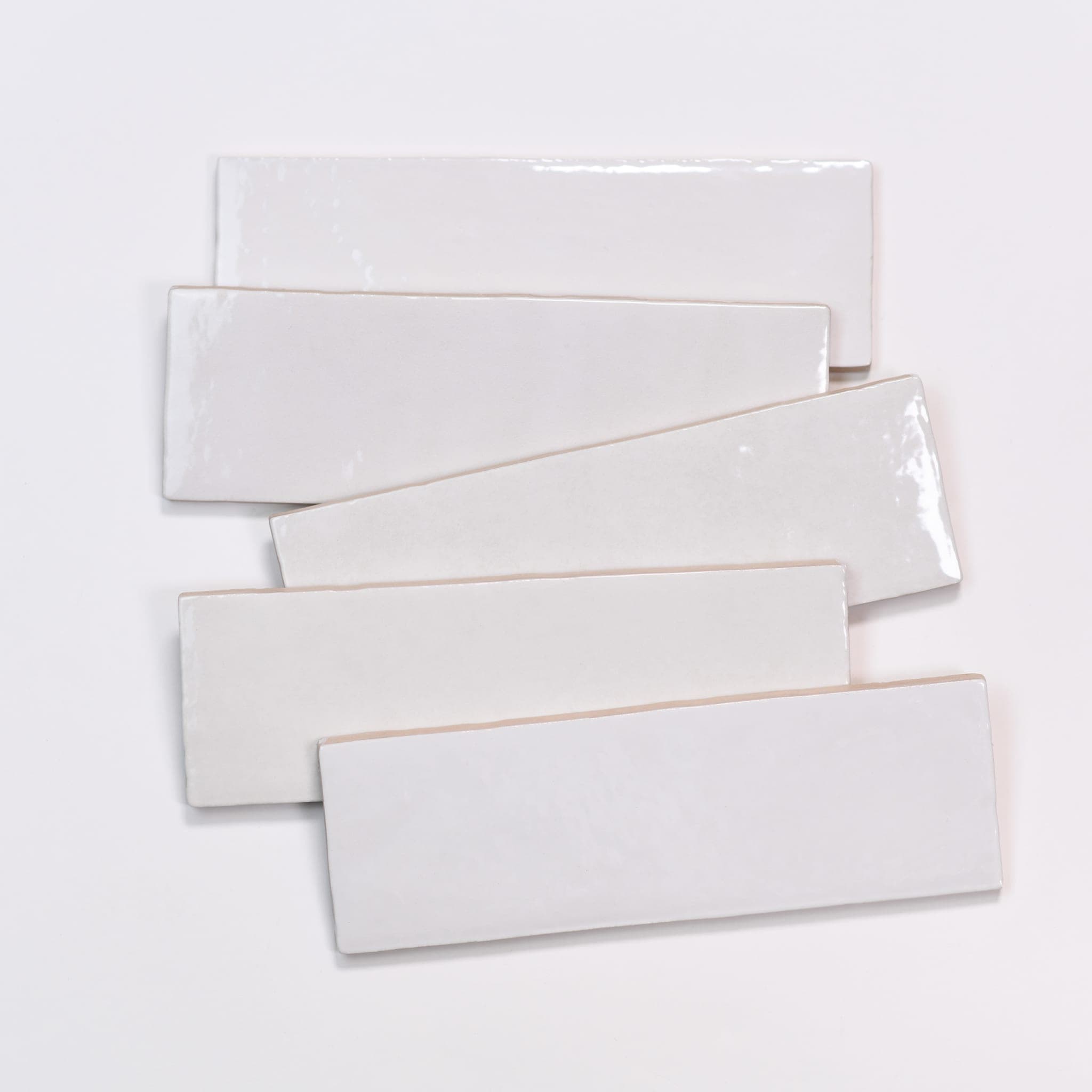 Cloé 2.5X8 Glossy Ceramic Tile in White - atb5k5cje2kjxbqsx7mi@2x.jpg