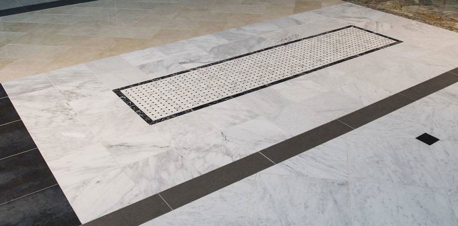 Arabescato Carrara with Black Marble Basket Weave Pattern Honed in a Mesh - gbyyqagn0gvr6w0lpyud@2x.jpg