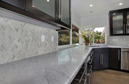 Carrara White Herringbone Honed - kkbcq2df6epqkqiqnsi5@2x.jpg