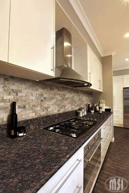 Tan Brown Granite - muuvr169scgsam6ekfru@2x.jpg